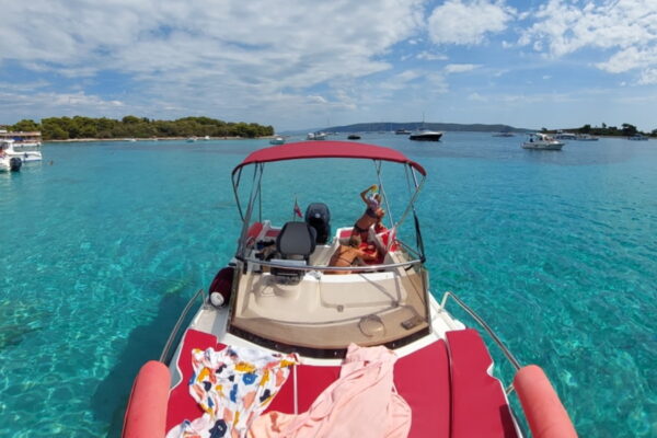 red-boat-in-deep-blue-sea-island-solta