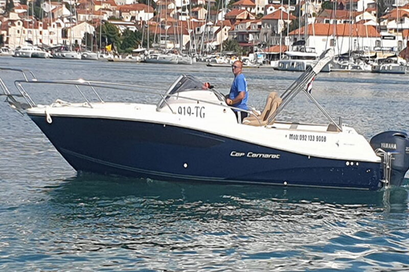 white-boat-cap-camarat-in-dark-blue-sea
